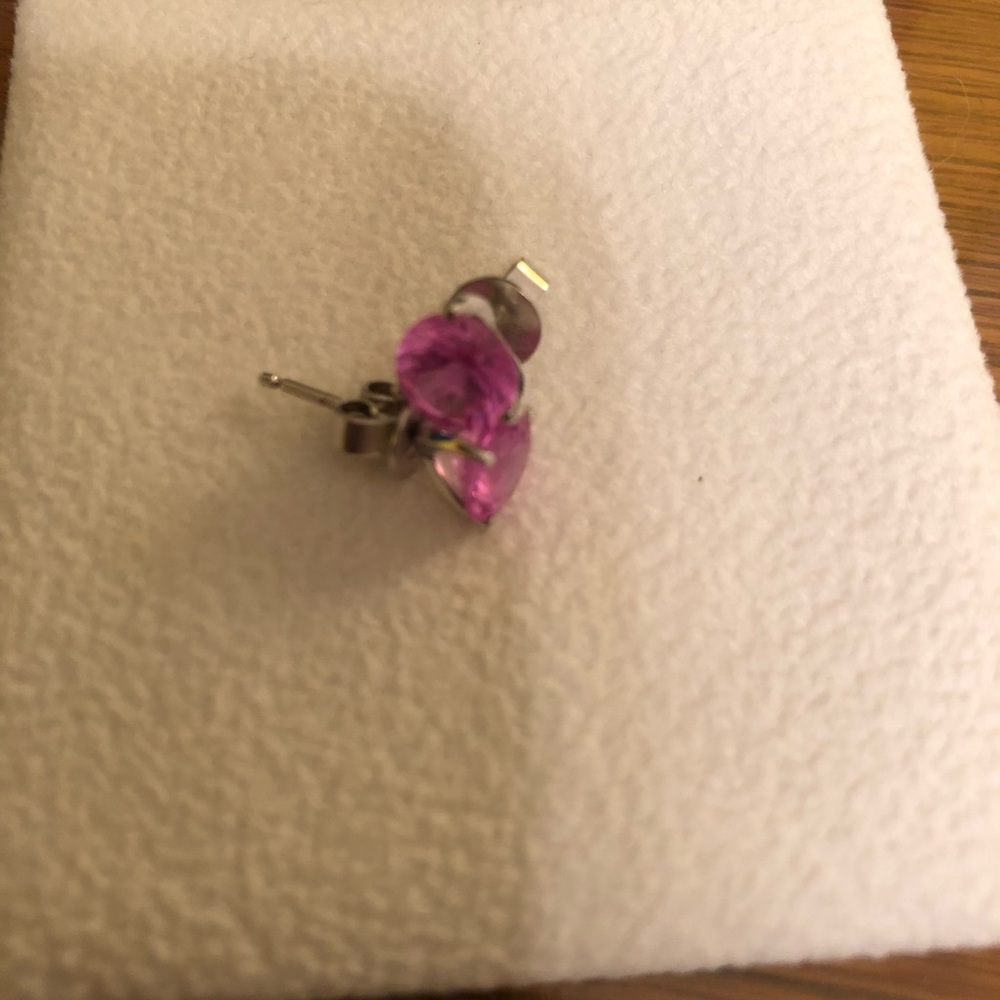 Lab created pink sapphire stud earrings.